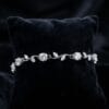 silver plated cubic zirconia vine bracelet with oval cut stones and leaf design