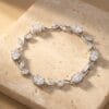 silver plated cubic zirconia vine bracelet with oval cut stones and leaf design for women