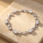 silver plated cubic zirconia vine bracelet with oval cut stones and leaf design for women