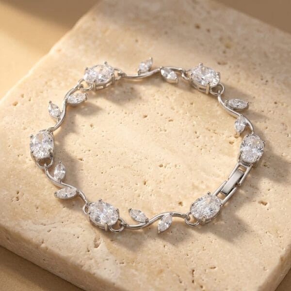 silver plated cubic zirconia vine bracelet with oval cut stones and leaf design for women