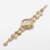Gold plated pearl floral bracelet watch for women with double chain and daisy charms - Diva Delight